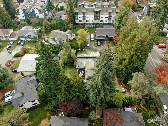 an aerial view of waterside residential houses with outdoor space