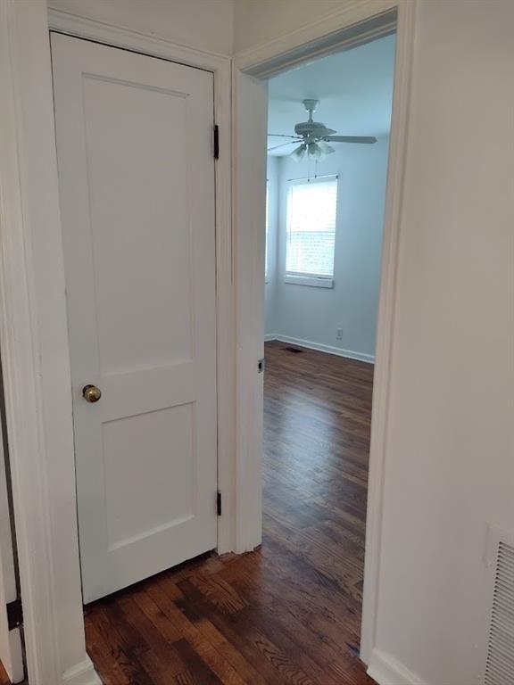 223 Sterling Street, Unit A Decatur, GA 30030 - Photo 14 of 36 a view of an empty room with wooden floor and a window