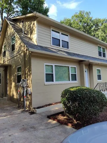 a view of a house with a patio