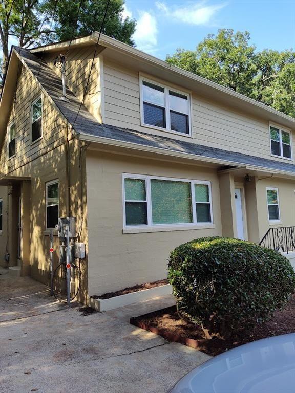 223 Sterling Street, Unit A Decatur, GA 30030 - Photo 2 of 36 a view of a house with a patio