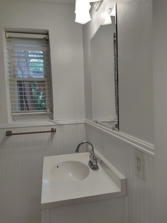 223 Sterling Street, Unit A Decatur, GA 30030 - Photo 21 of 36 a bathroom with a sink and a mirror