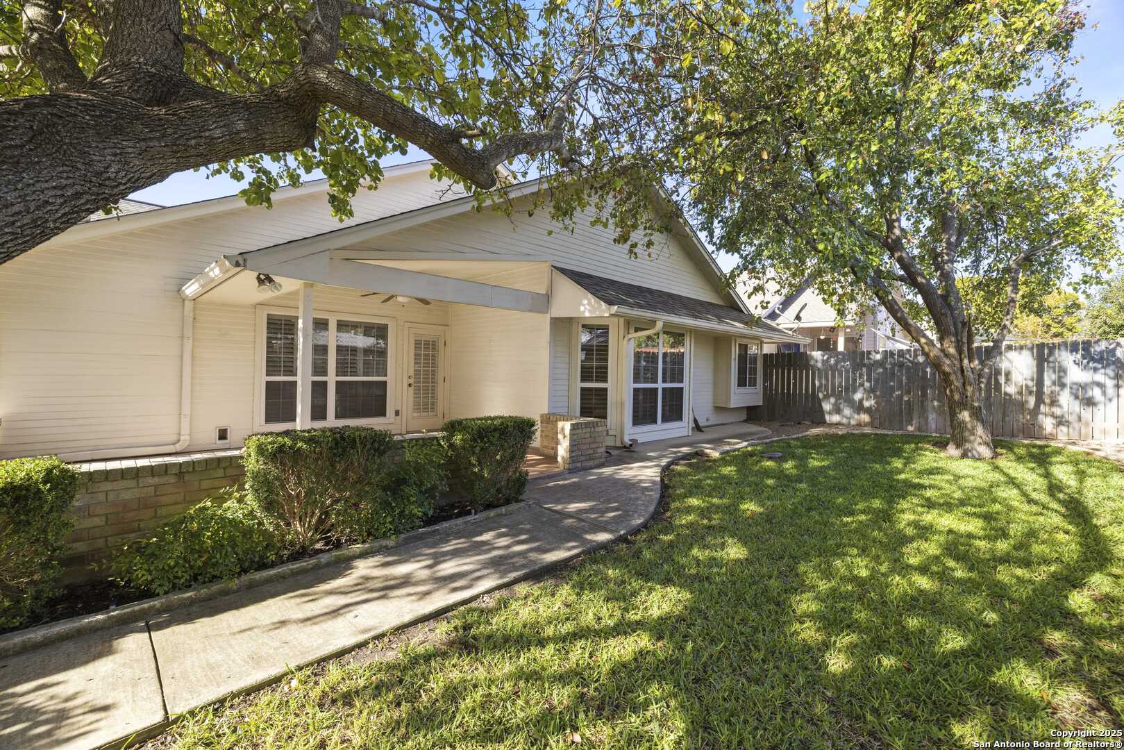 129 Los Cedros Loop Kerrville, TX 78028 - Photo 19 of 26 a view of a yard in front of house