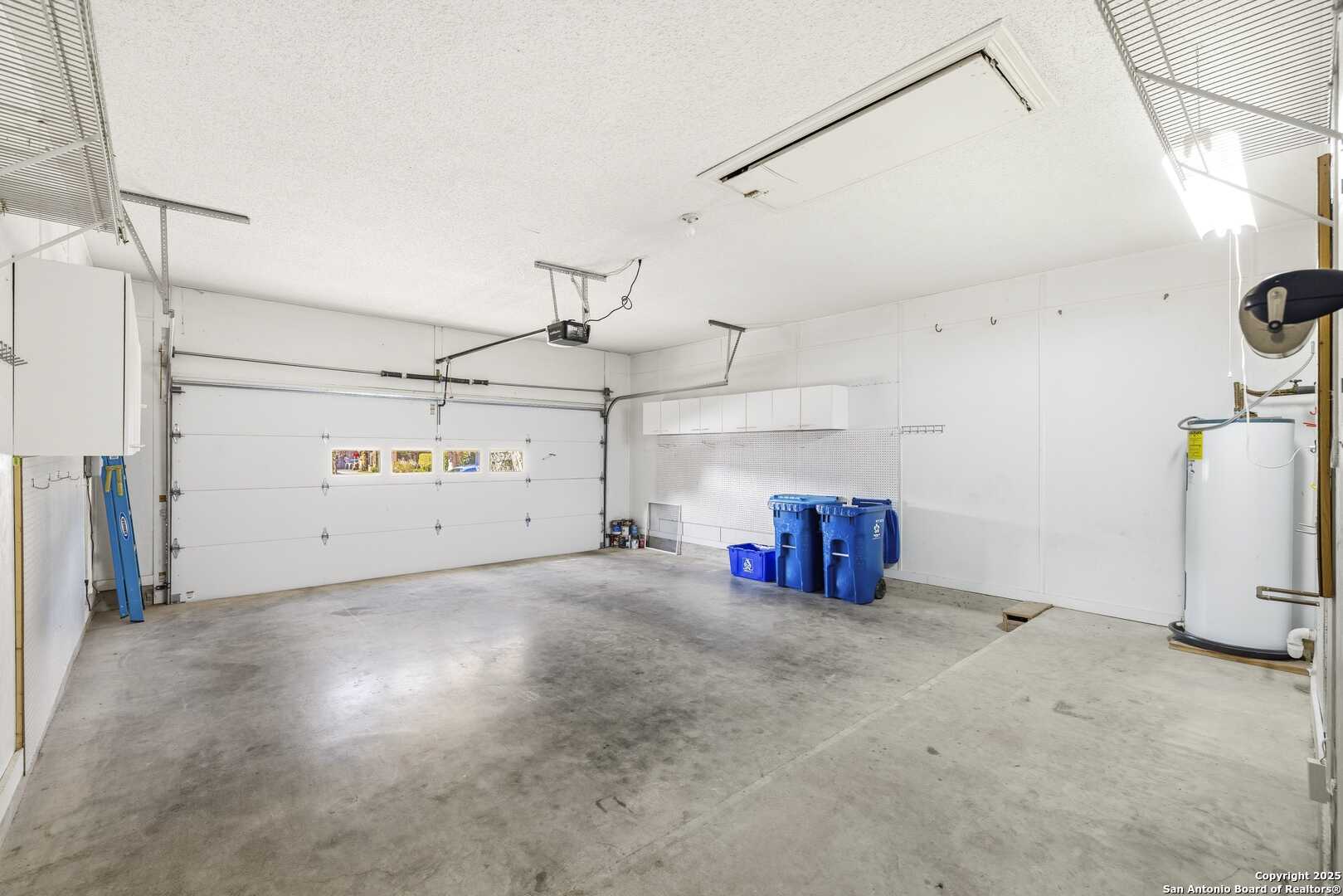 129 Los Cedros Loop Kerrville, TX 78028 - Photo 25 of 26 a view of a storage & utility room with lots of racks