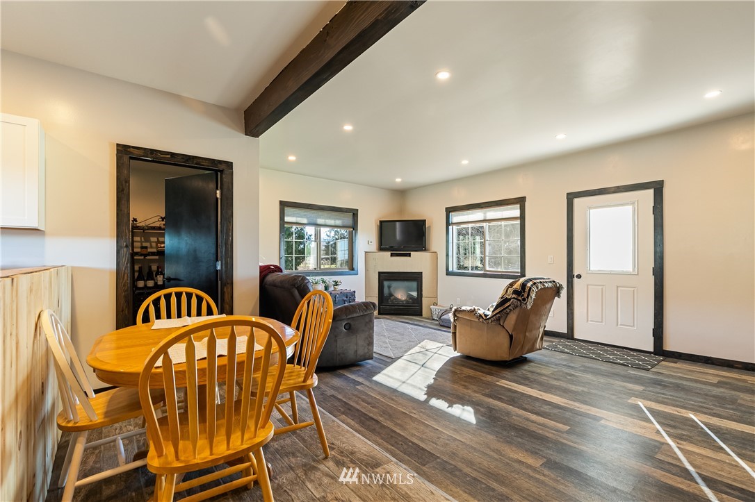 5651 Putnam Road Everson, WA 98247 - Photo 19 of 38 a living room with furniture and wooden floor