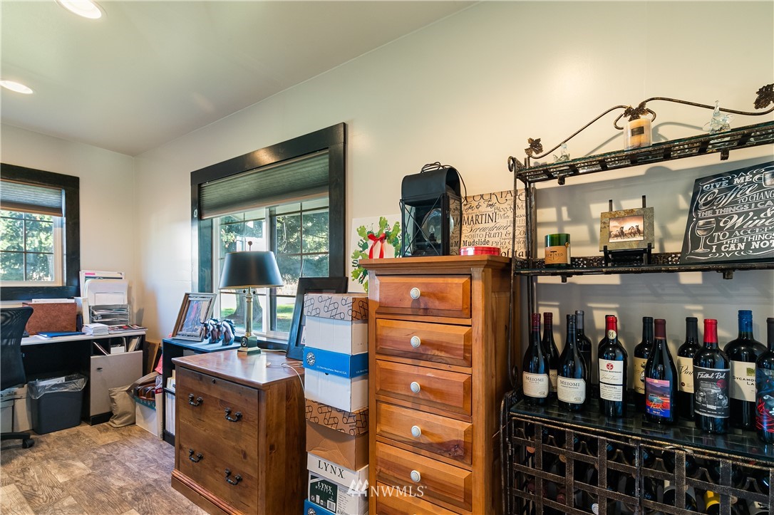 5651 Putnam Road Everson, WA 98247 - Photo 23 of 38 a room with table chairs and wooden floor