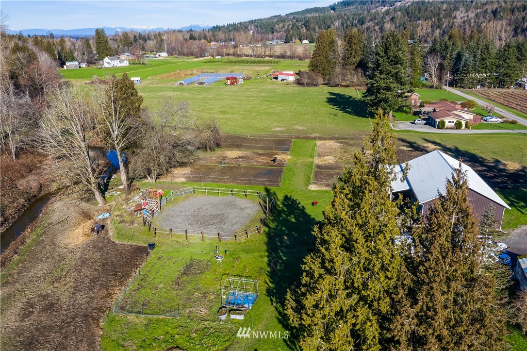 5651 Putnam Road Everson, WA 98247 - Photo 3 of 38 a view of a lake with a yard