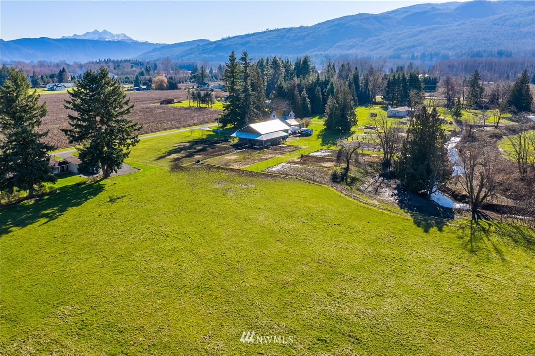 5651 Putnam Road Everson, WA 98247 - Photo 6 of 38 a view of a lake with a mountain