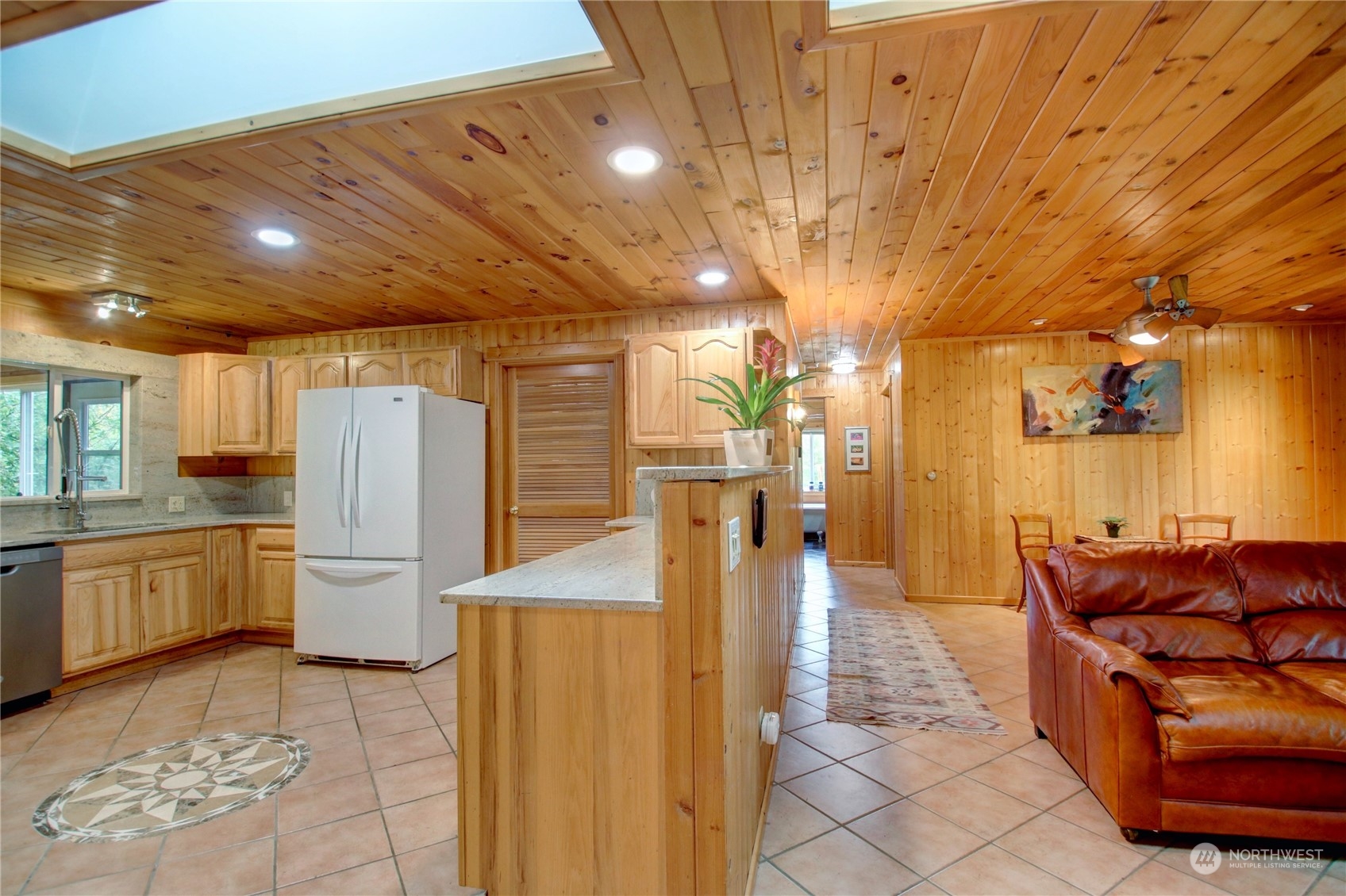 9363 Silver Lake Road Maple Falls, WA 98266 - Photo 12 of 38 a lobby with furniture and a kitchen
