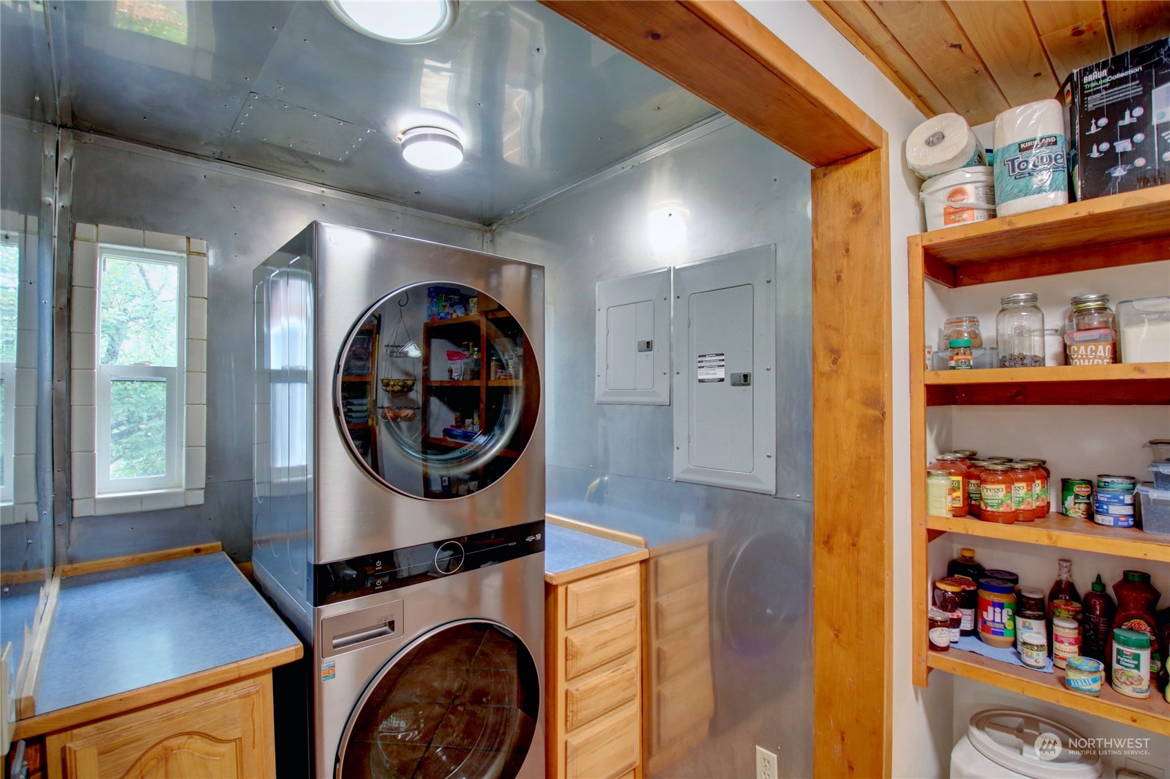 9363 Silver Lake Road Maple Falls, WA 98266 - Photo 25 of 38 a view of a bedroom with washer and dryer