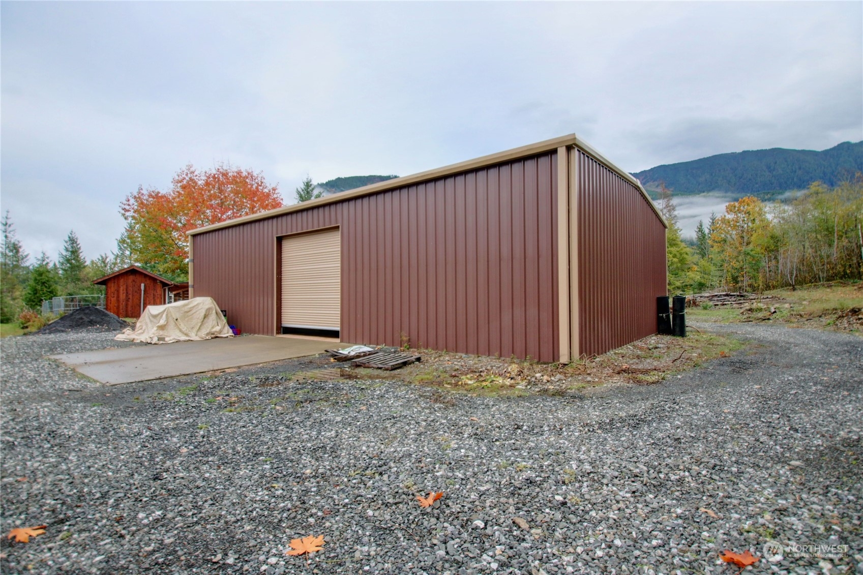 9363 Silver Lake Road Maple Falls, WA 98266 - Photo 29 of 38 a view of a house with a backyard