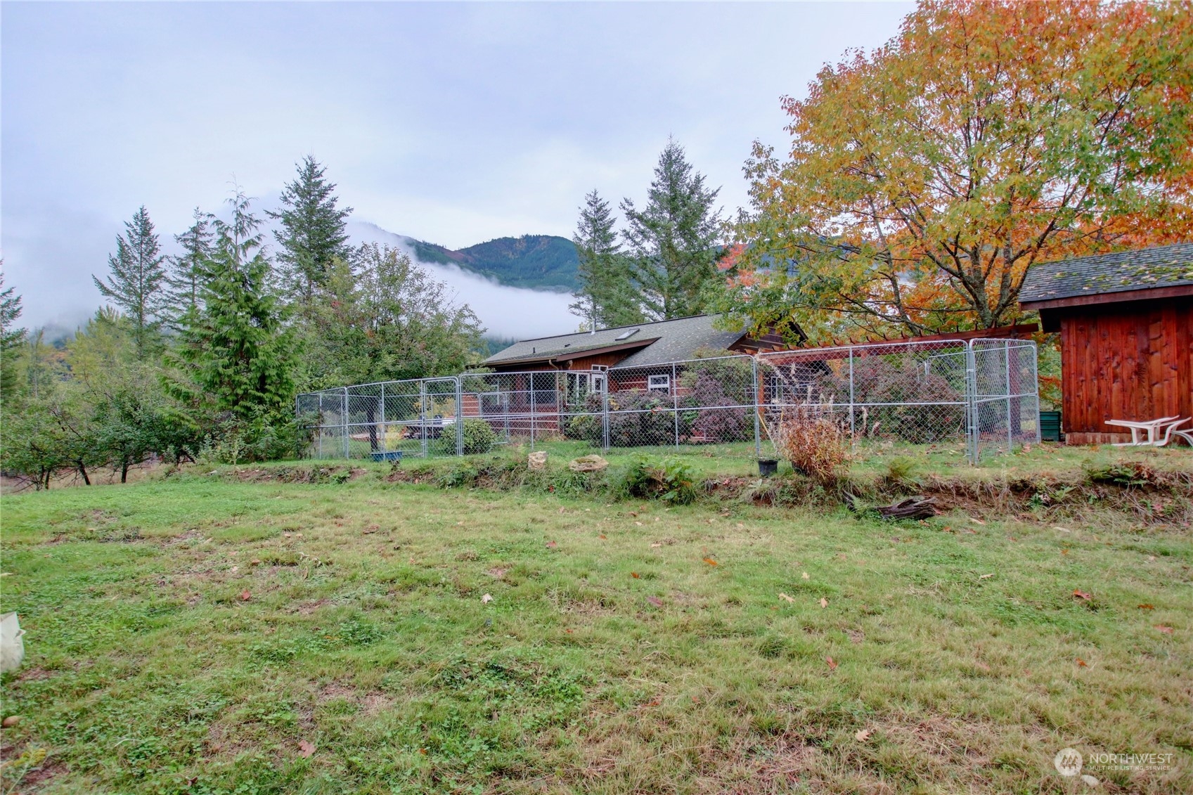 9363 Silver Lake Road Maple Falls, WA 98266 - Photo 34 of 38 a view of a house with a backyard