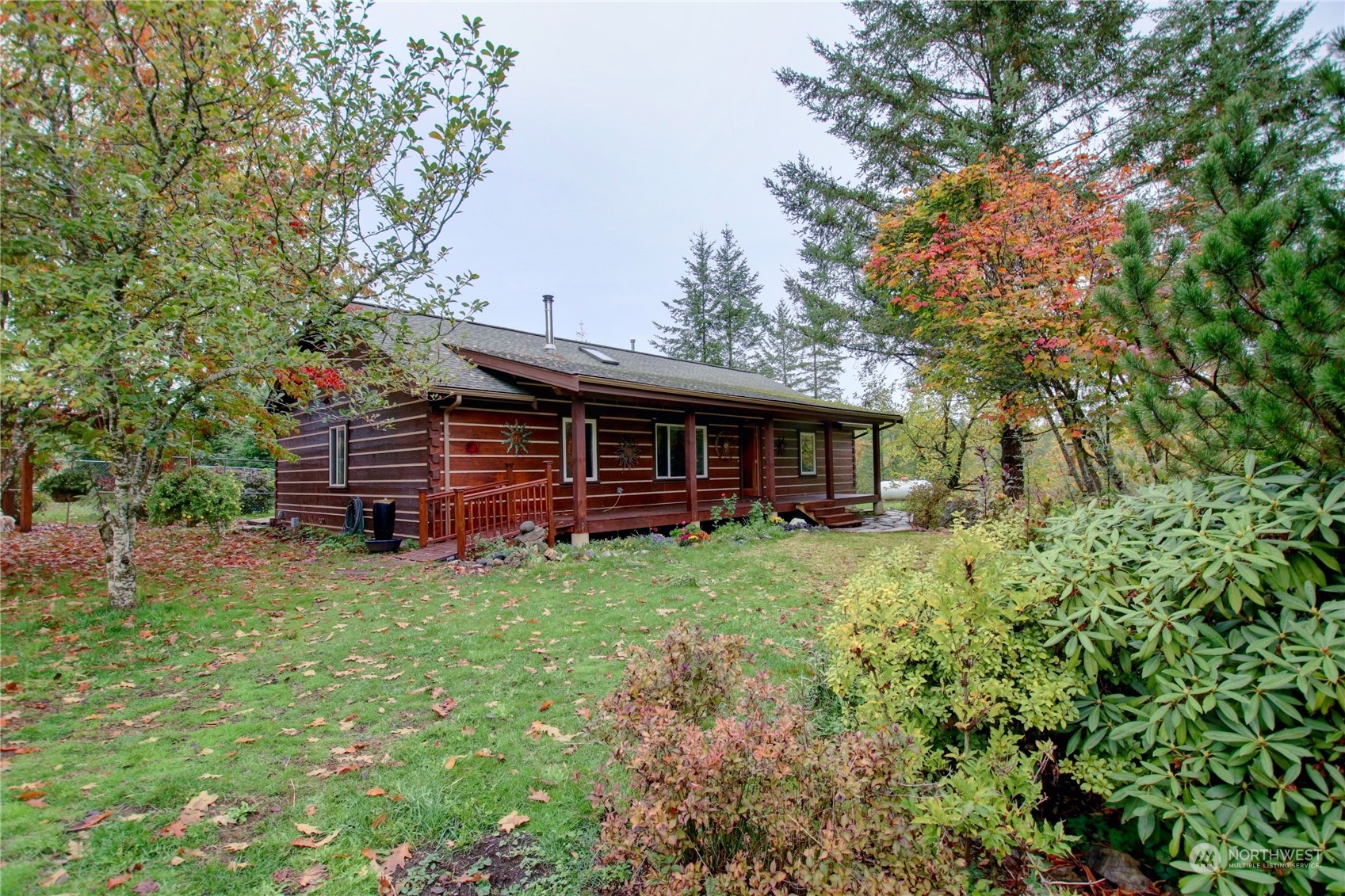 9363 Silver Lake Road Maple Falls, WA 98266 - Photo 4 of 38 a view of a house with a backyard