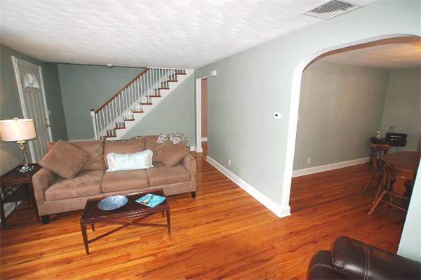 26 Fern Road Medford, MA 02155 - Photo 14 of 27 a living room with furniture and a wooden floor