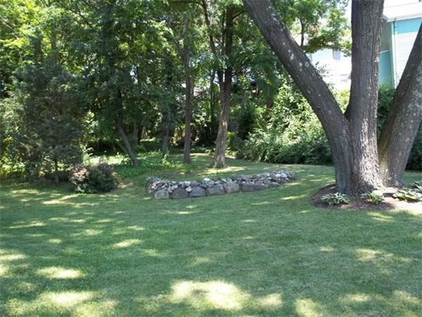 26 Fern Road Medford, MA 02155 - Photo 4 of 27 a view of a park that has large trees