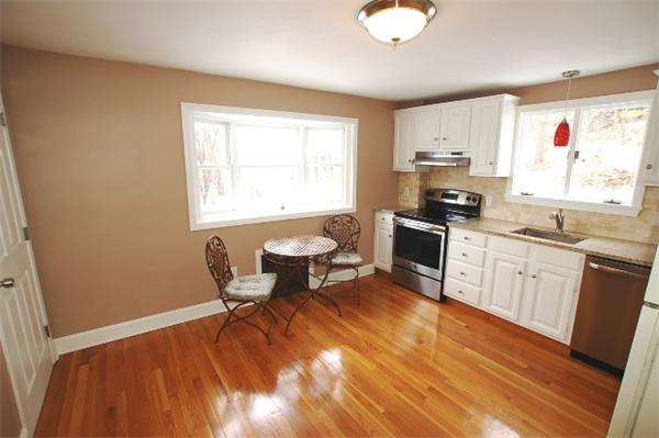 26 Fern Road Medford, MA 02155 - Photo 7 of 27 a kitchen with a sink appliances cabinets and a window