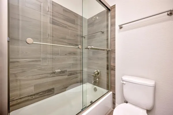 an empty room with closet area