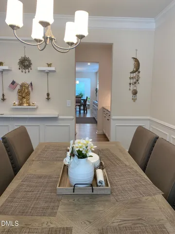 a room with a book shelf and a shelf