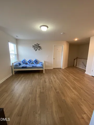 a bathroom with a mirror and vanity