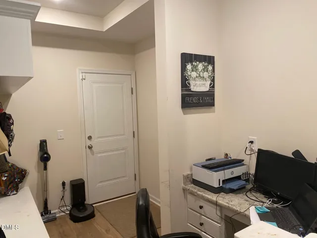 a outdoor living space with patio furniture and potted plants