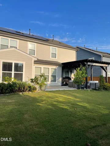 a view of a house with a garden