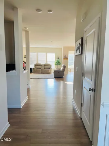 a view of a living room and a kitchen