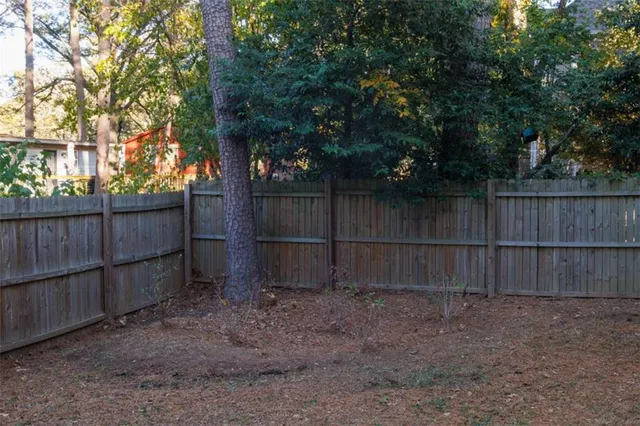 a view of a wooden fence