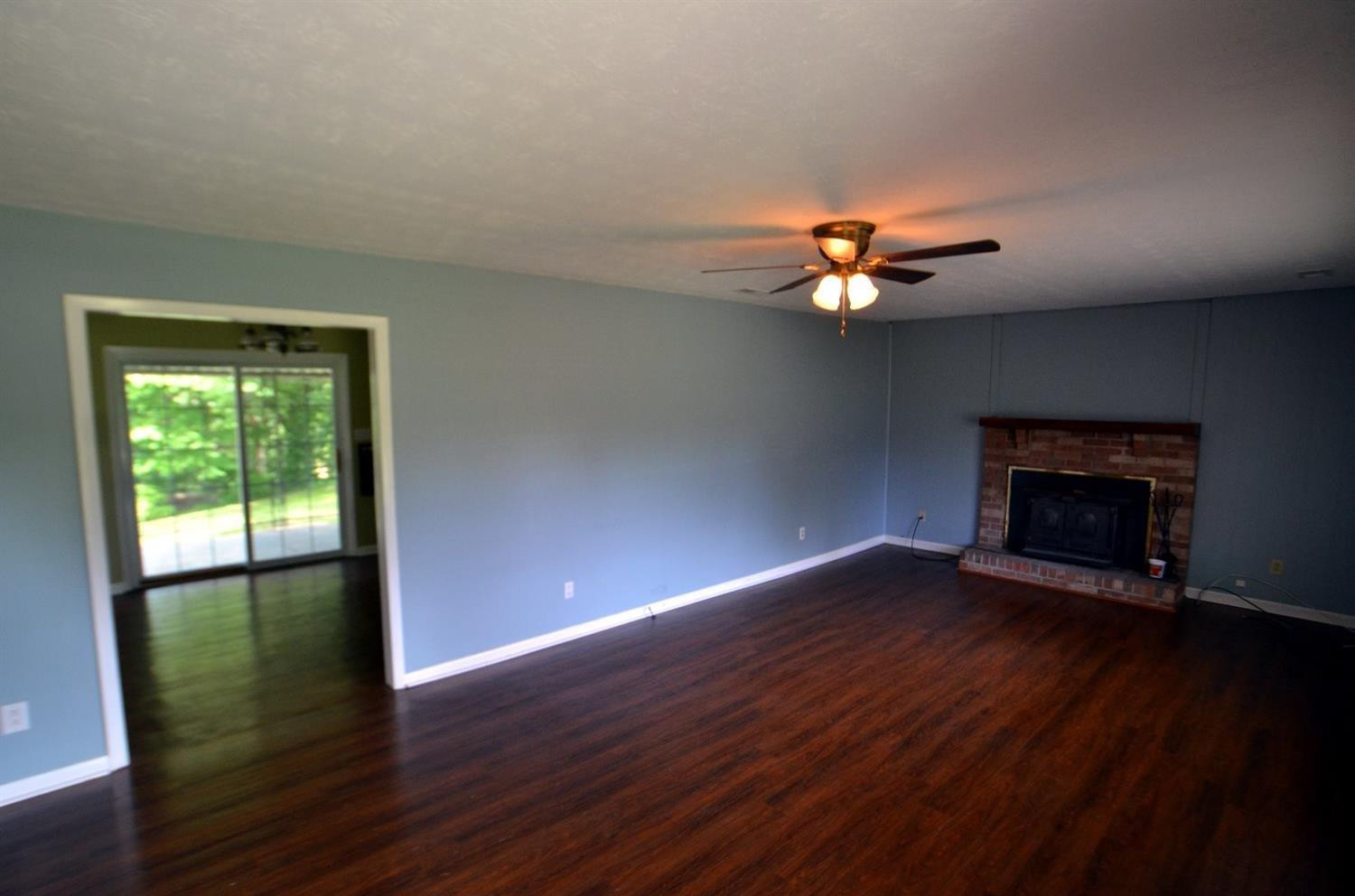 2140 Sand Hill Road Irvine, KY 40336 - Photo 6 of 29 Large and inviting living room with bric