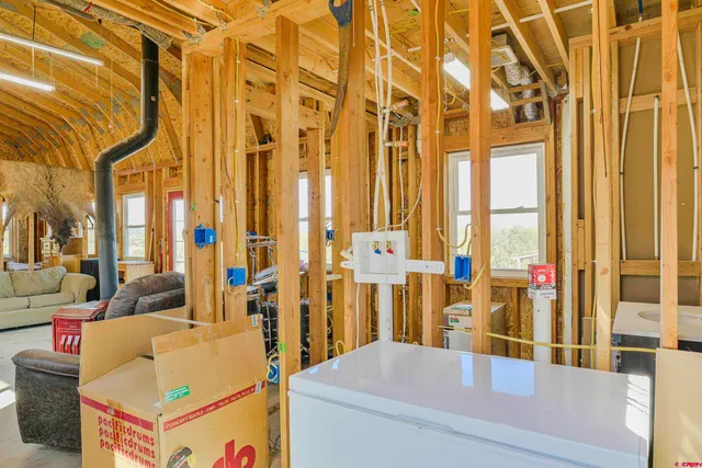 a view of living room and utility room