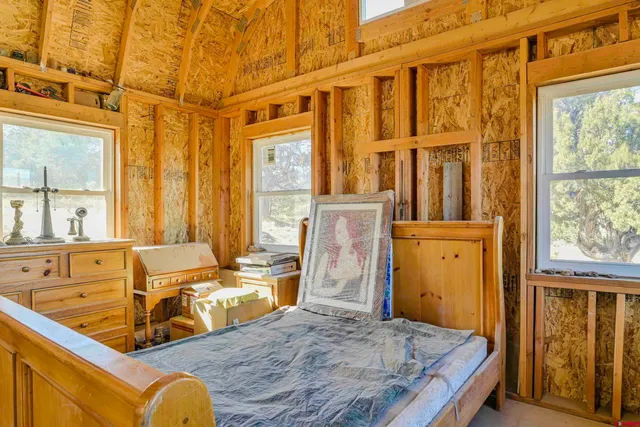 a bathroom with a sink a mirror and a shower