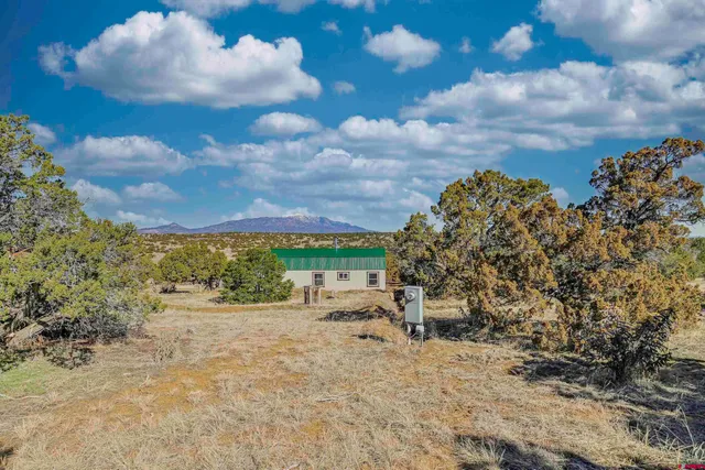 a view of lake with green space