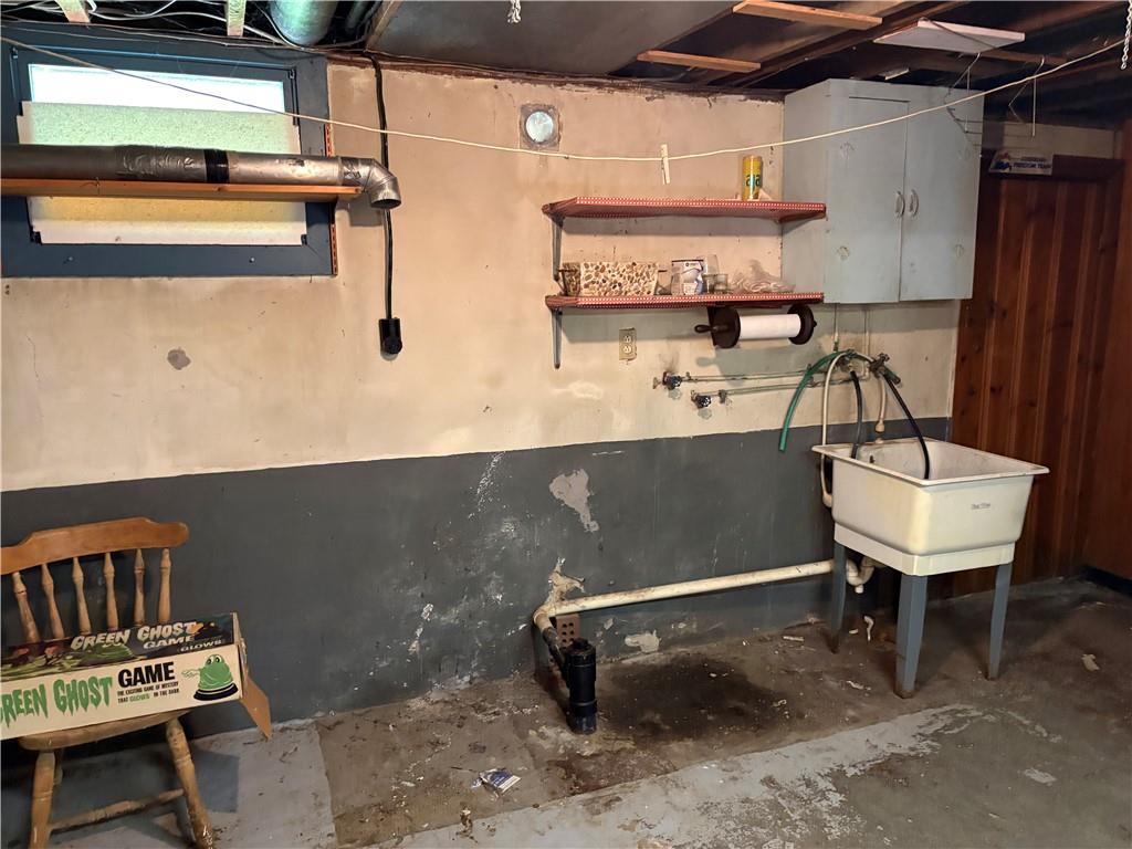 1926 Rte 908 Natrona Heights, PA 15065 - Photo 29 of 33 BASEMENT AREA WITH HOOK UPS WASHER DRYER & LAUNDRY TUB