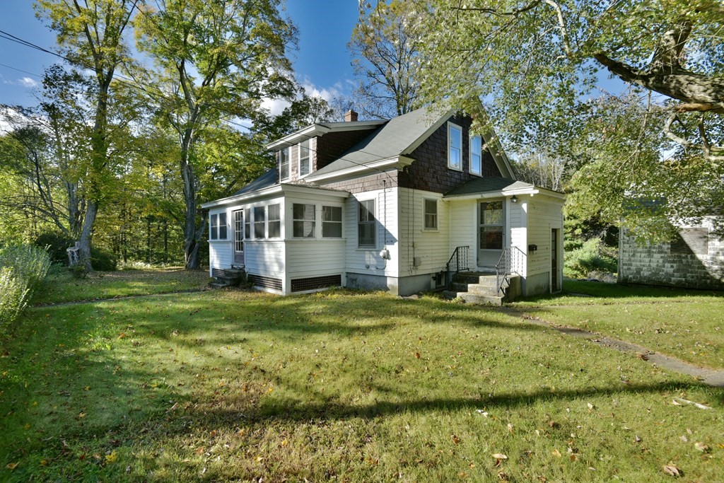 563 Mendon Road Whitinsville, MA 01588 - Photo 2 of 30 a front view of a house with a garden