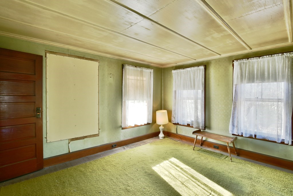 563 Mendon Road Whitinsville, MA 01588 - Photo 24 of 30 a spacious bedroom with a bed and a window