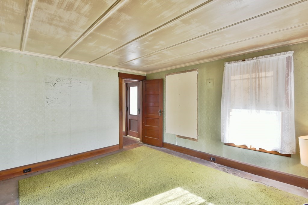 563 Mendon Road Whitinsville, MA 01588 - Photo 25 of 30 a view of an empty room with a window