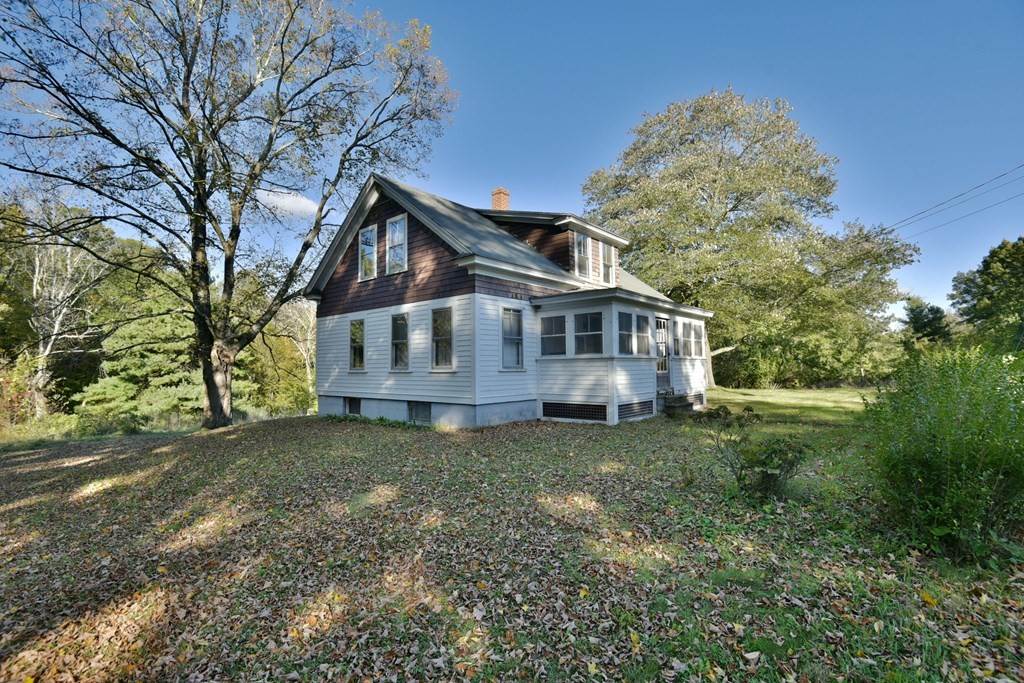 563 Mendon Road Whitinsville, MA 01588 - Photo 4 of 30 a view of a house with a yard