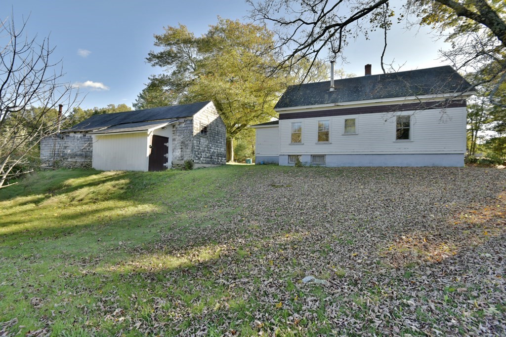 563 Mendon Road Whitinsville, MA 01588 - Photo 7 of 30 a view of a house with a yard