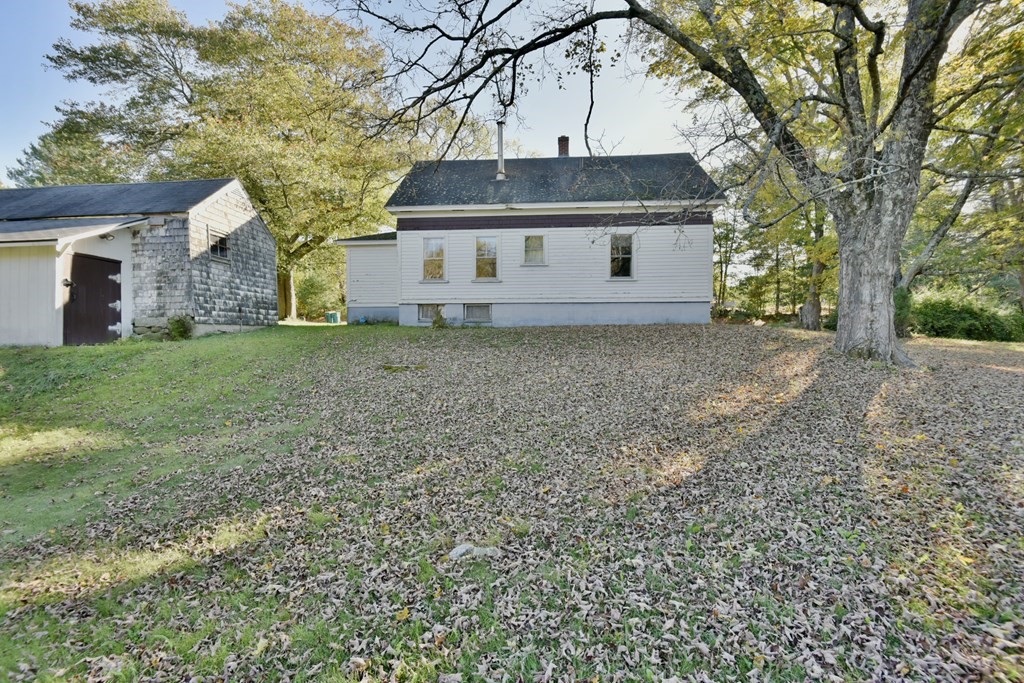 563 Mendon Road Whitinsville, MA 01588 - Photo 8 of 30 a front view of a house with a yard