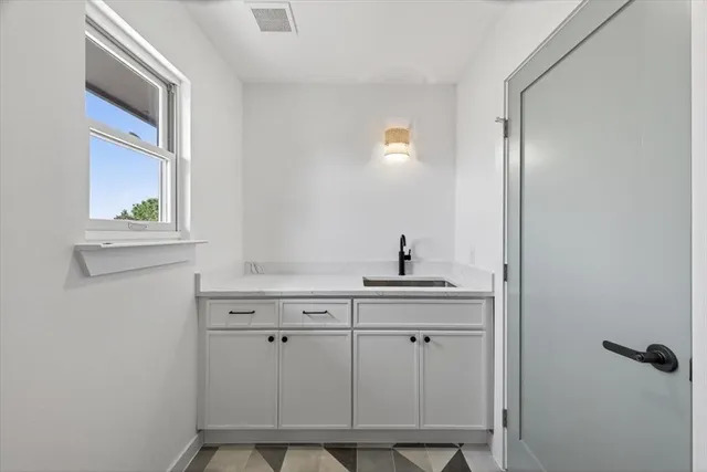 a view of a balcony with wooden floor