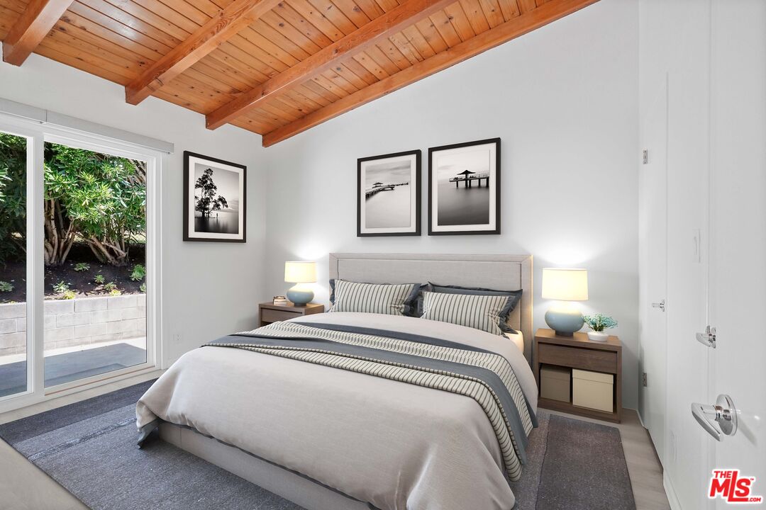 31259 Bailard Road Malibu, CA 90265 - Photo 13 of 41 a bedroom with a bed and a window