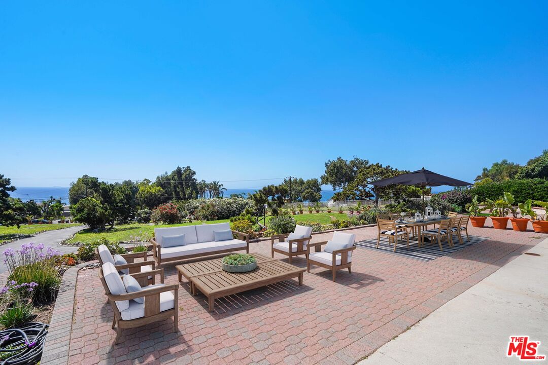 31259 Bailard Road Malibu, CA 90265 - Photo 28 of 41 a view of a terrace with furniture and garden