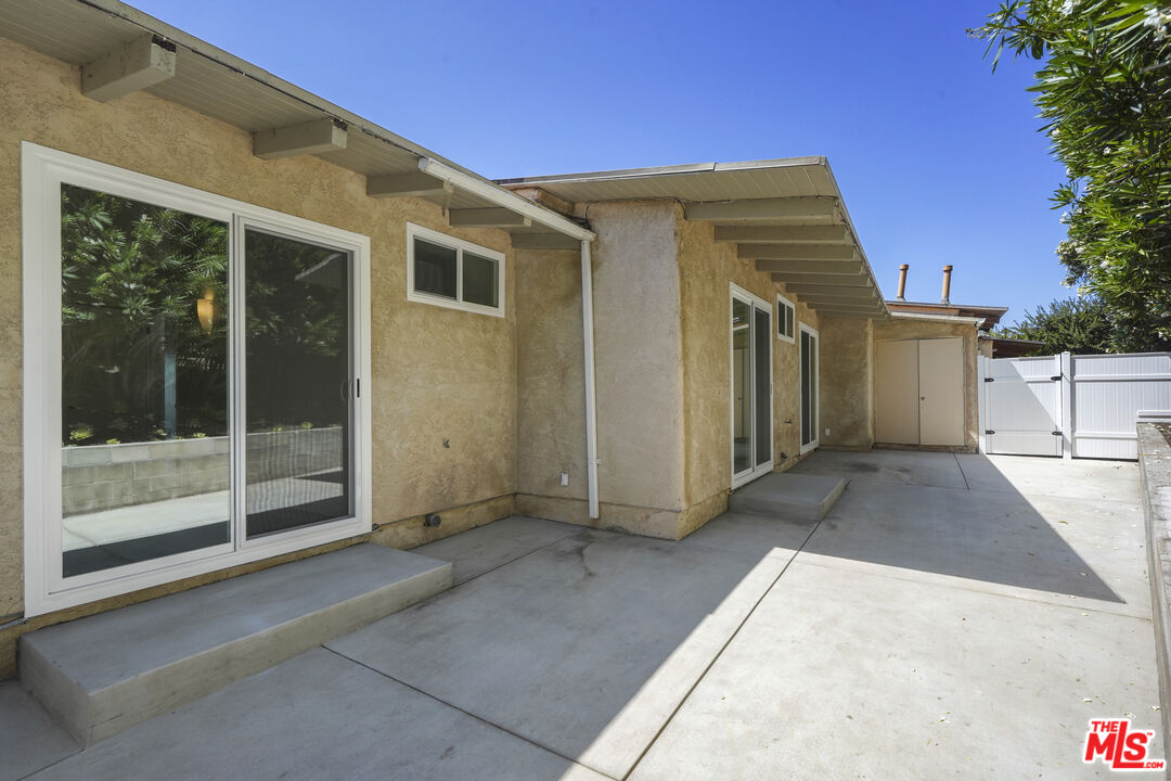 31259 Bailard Road Malibu, CA 90265 - Photo 37 of 41 a view of a house with a backyard