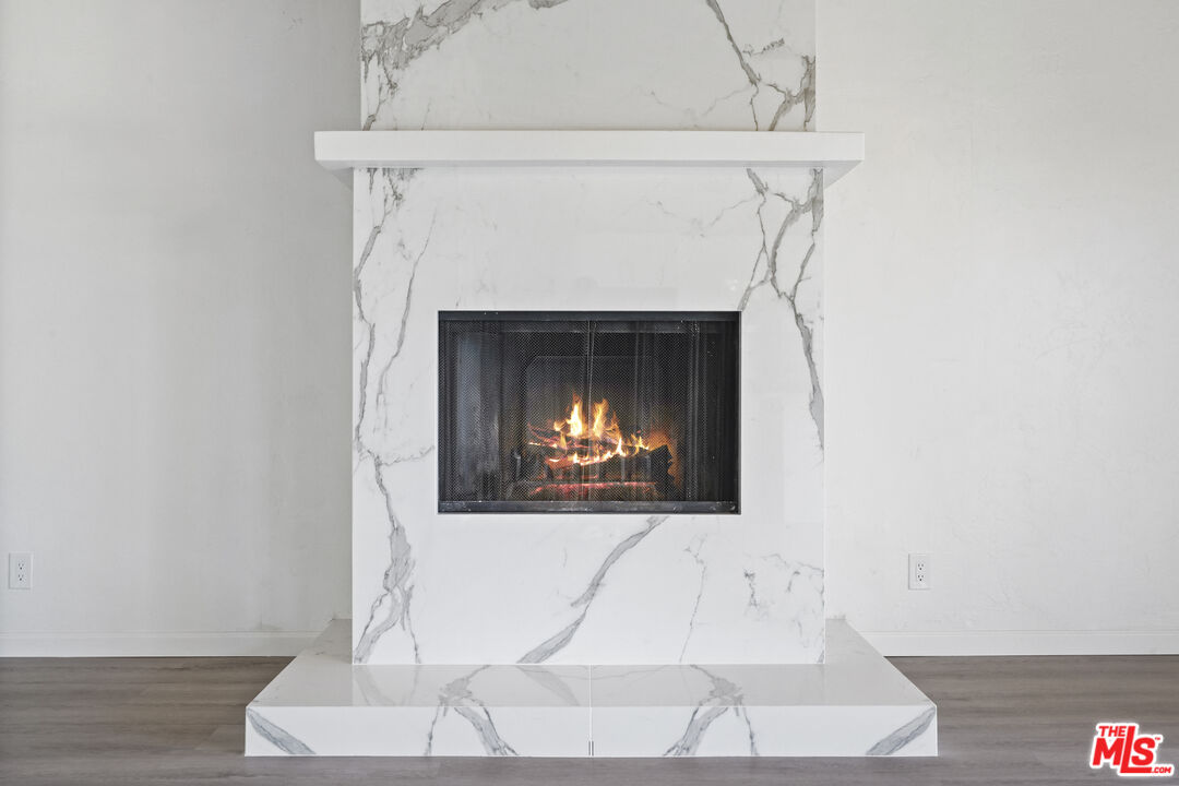 31259 Bailard Road Malibu, CA 90265 - Photo 5 of 41 a living room with a fireplace