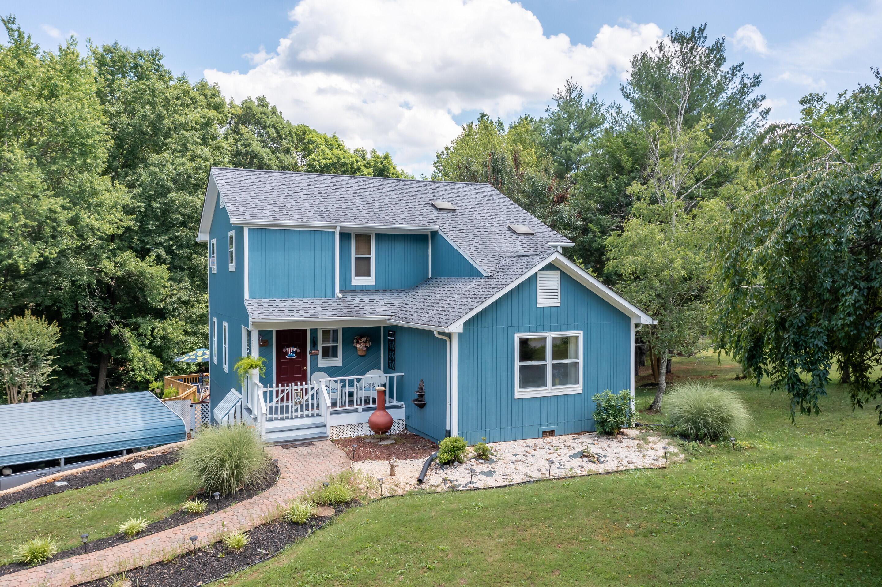 1096 Farmington Road Hardy, VA 24101 - Photo 1 of 54 a front view of house with yard and green space