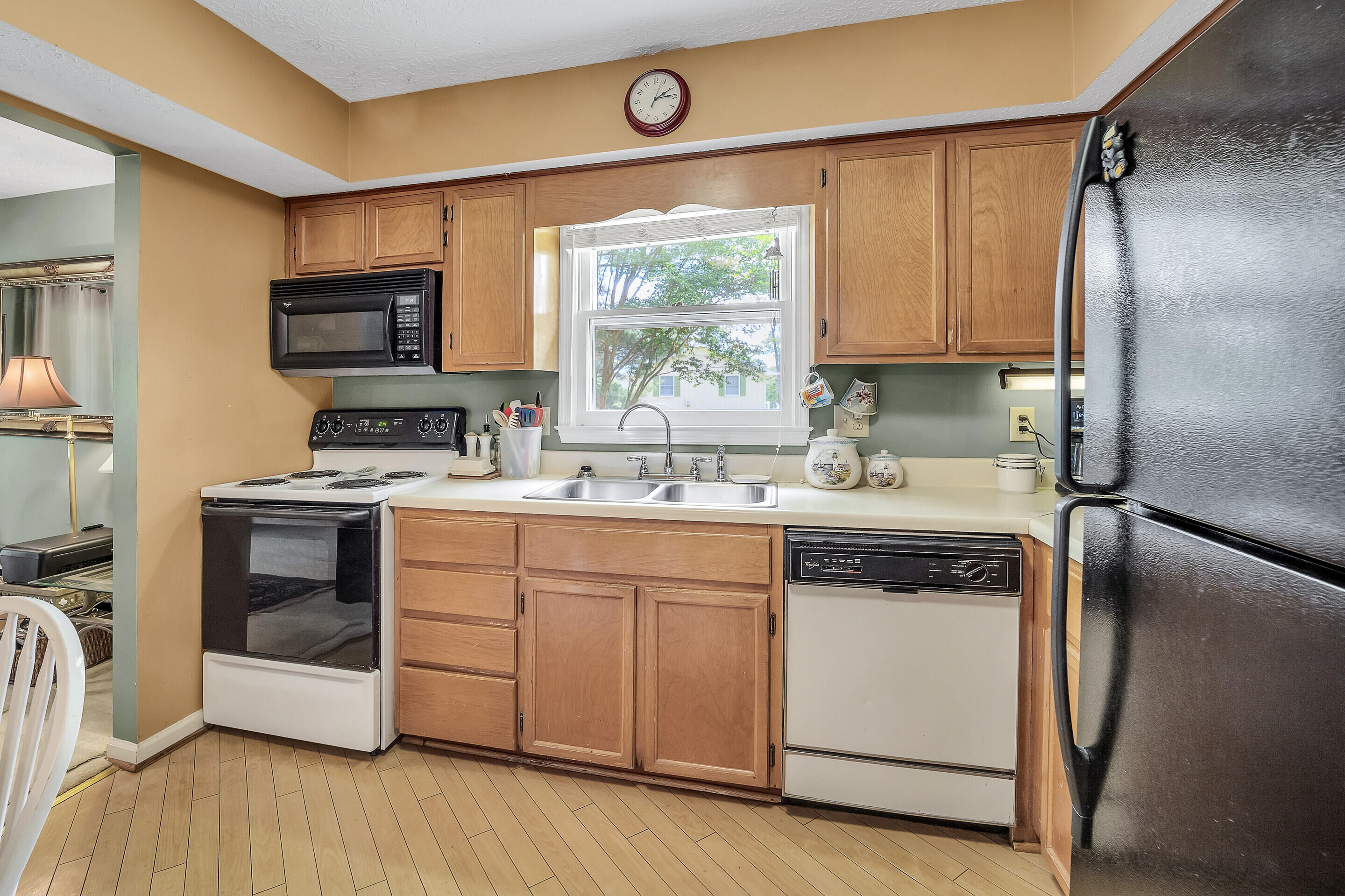 1096 Farmington Road Hardy, VA 24101 - Photo 16 of 54 a kitchen with a white cabinets and wooden floor