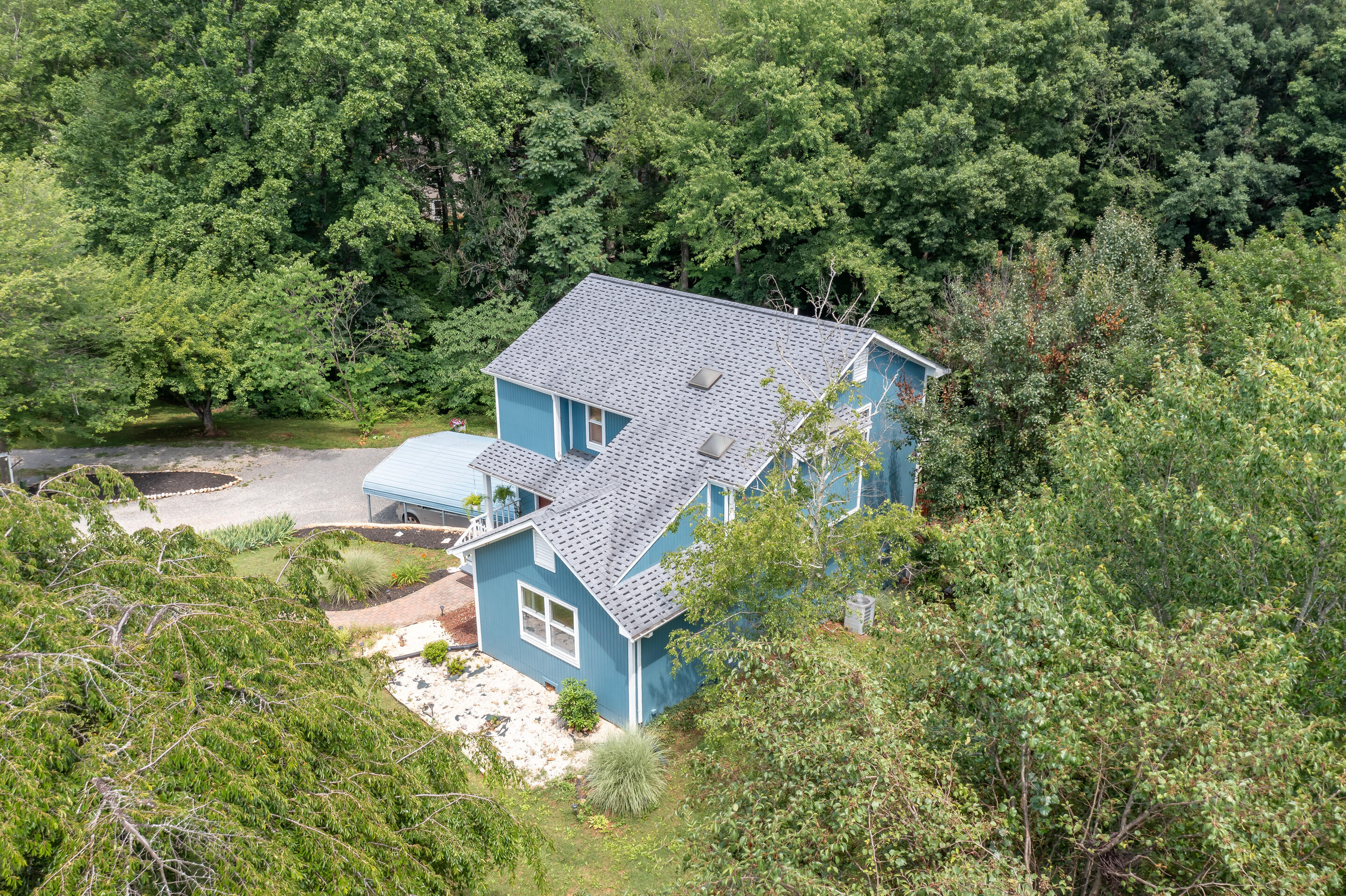1096 Farmington Road Hardy, VA 24101 - Photo 3 of 54 an aerial view of a house with swimming pool and garden space