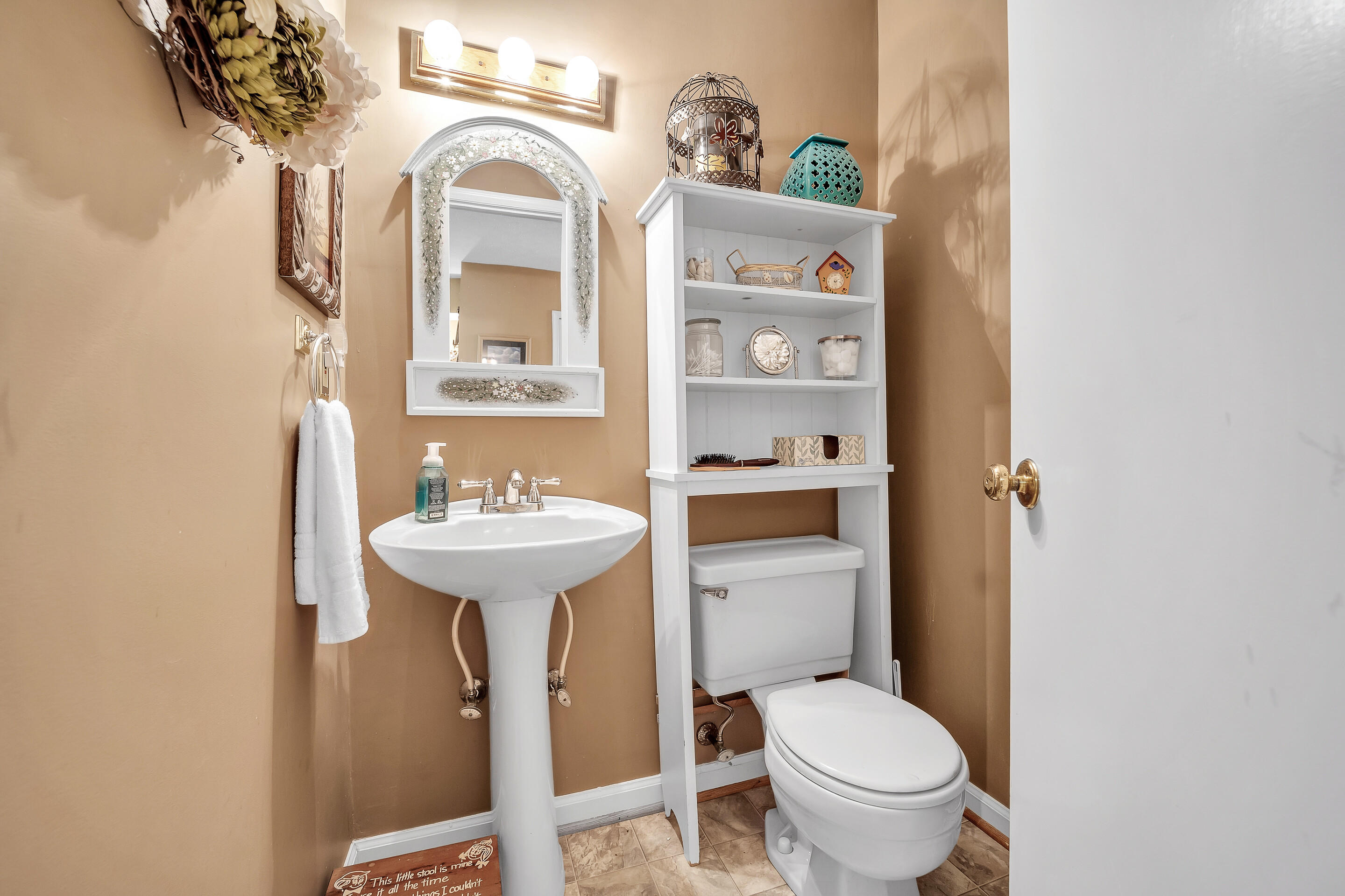1096 Farmington Road Hardy, VA 24101 - Photo 21 of 54 a bathroom with a toilet sink and mirror