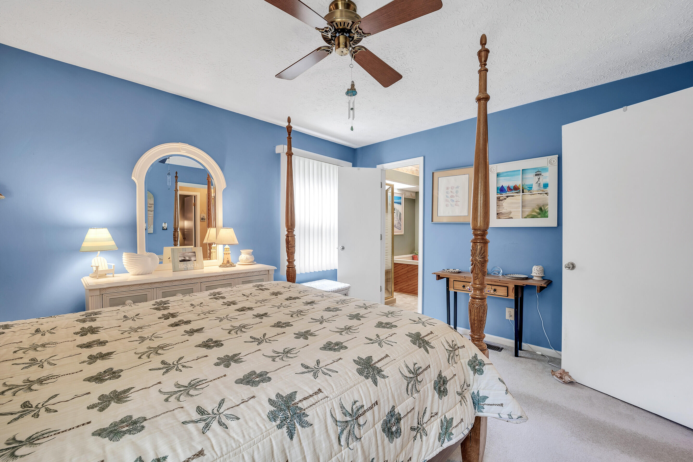 1096 Farmington Road Hardy, VA 24101 - Photo 29 of 54 a bedroom with a bed and a chandelier