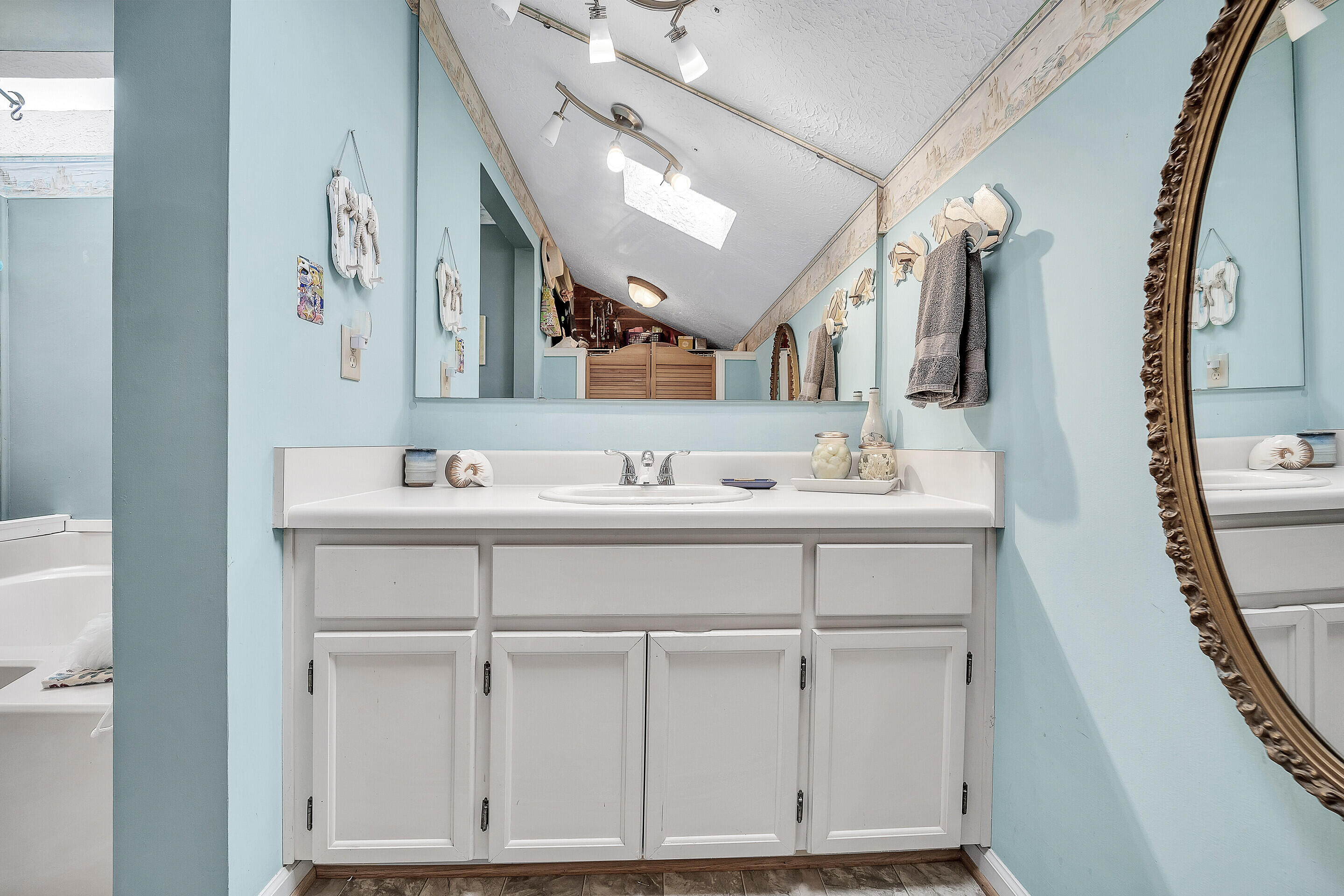 1096 Farmington Road Hardy, VA 24101 - Photo 33 of 54 a bathroom with a sink vanity and mirror
