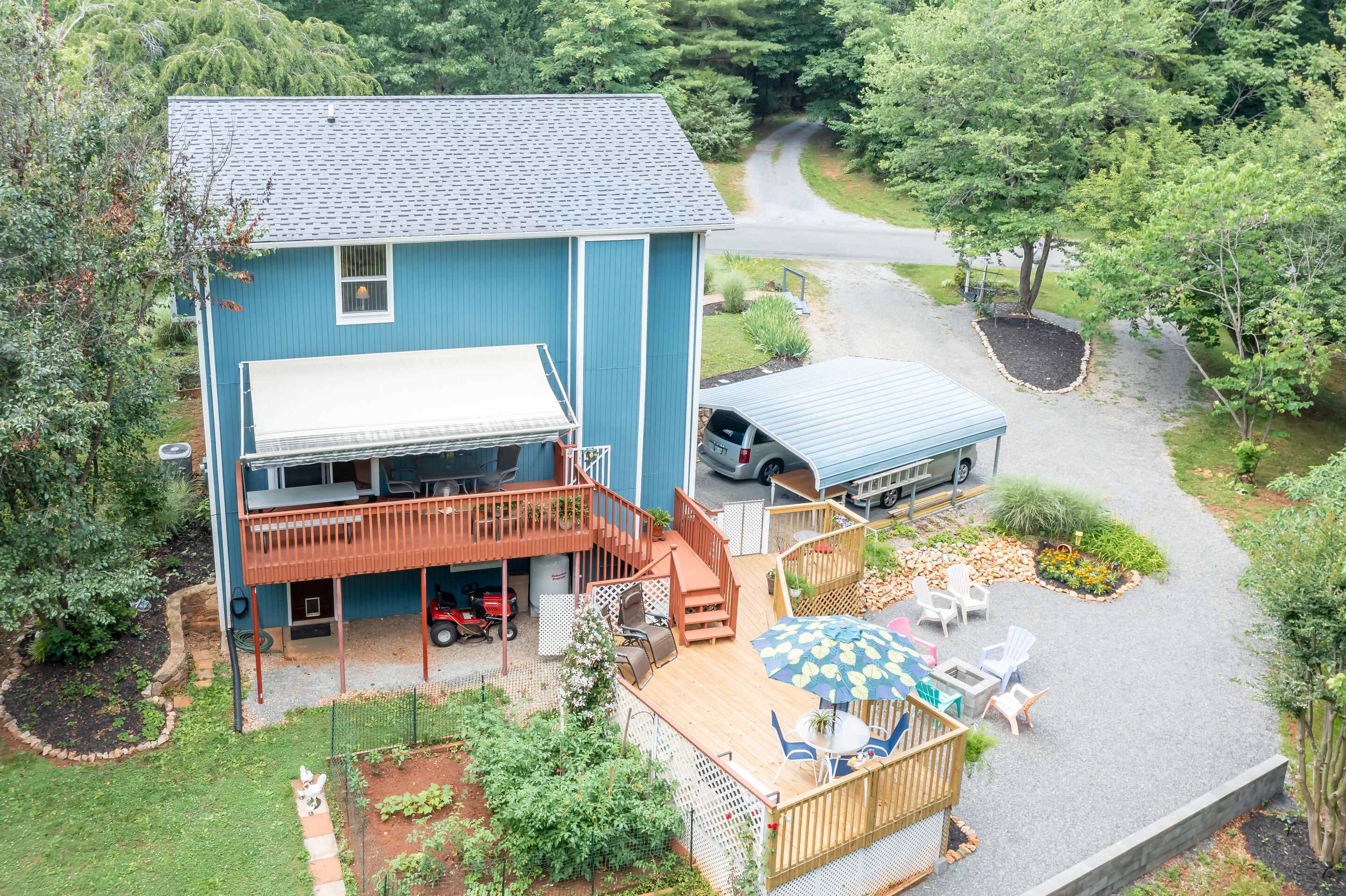 1096 Farmington Road Hardy, VA 24101 - Photo 40 of 54 an aerial view of a house with swimming pool and glass windows