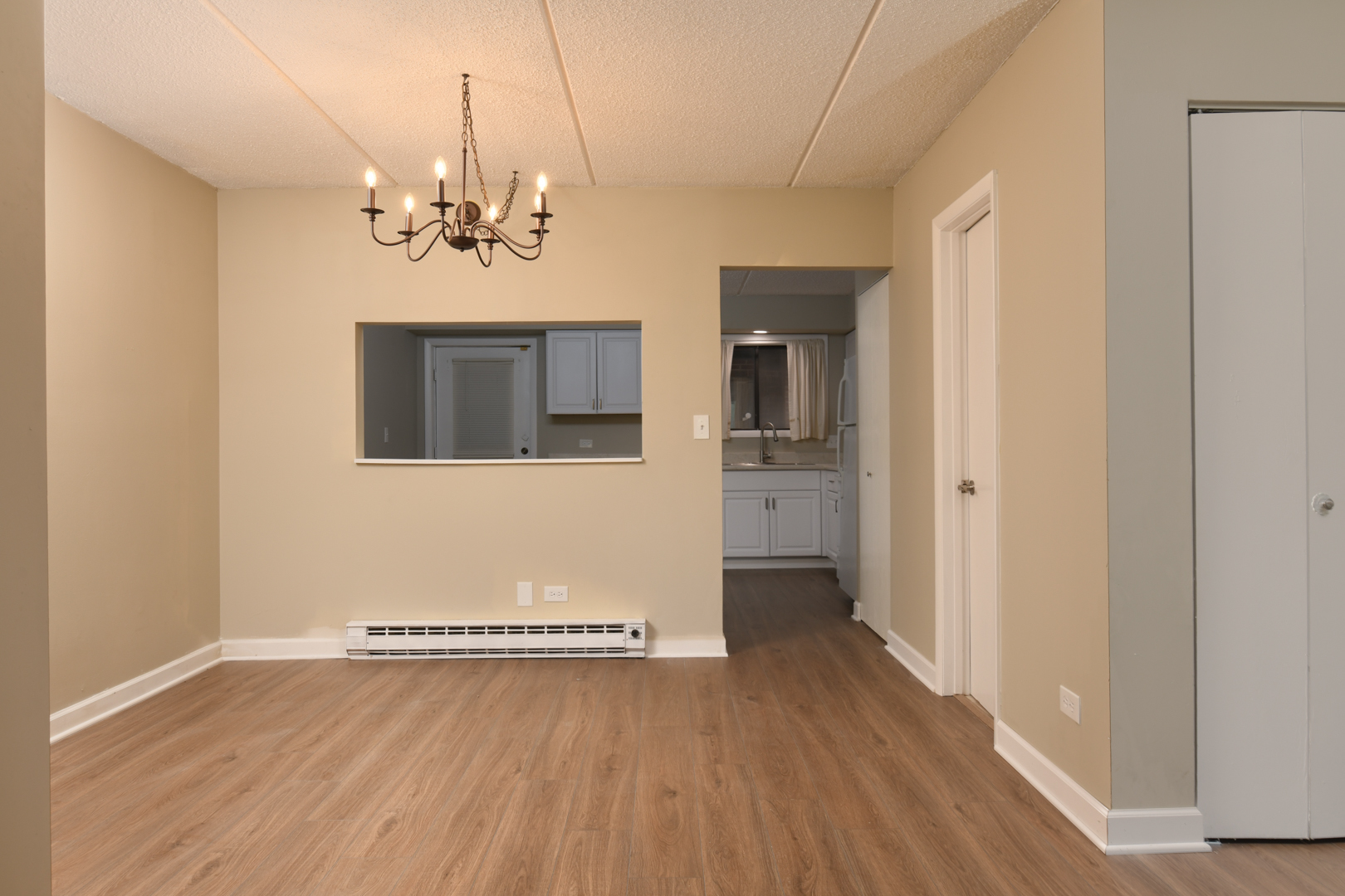 953 North Rohlwing Road, Unit GB Addison, IL 60101 - Photo 15 of 25 a view of a livingroom with a chandelier